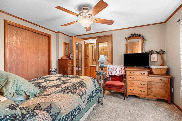 N5101 Lueck Ln, Princeton, WI 54968 - carpeted bedroom featuring crown molding, a closet, and a ceiling fan