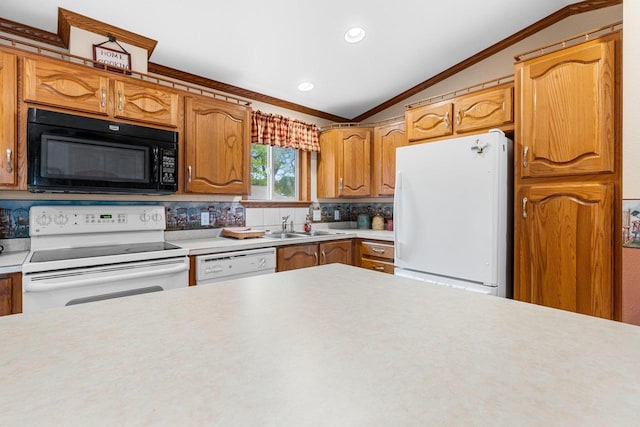 N5101 Lueck Ln, Princeton, WI 54968 - kitchen featuring white appliances, lofted ceiling, crown molding, light countertops, and decorative backsplash
