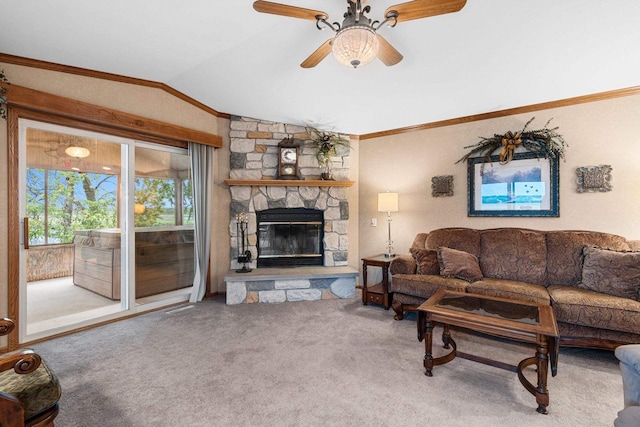 N5101 Lueck Ln, Princeton, WI 54968 - carpeted living area featuring lofted ceiling, ceiling fan, a fireplace, and ornamental molding