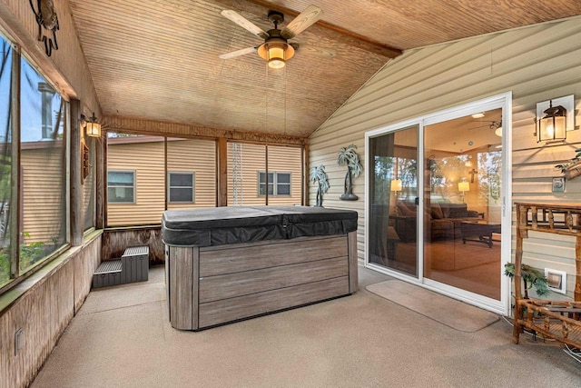 N5101 Lueck Ln, Princeton, WI 54968 - sunroom / solarium with a hot tub, a ceiling fan, and vaulted ceiling