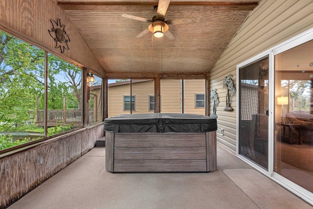 N5101 Lueck Ln, Princeton, WI 54968 - sunroom featuring a hot tub, vaulted ceiling, and a ceiling fan