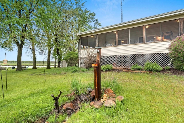 N5101 Lueck Ln, Princeton, WI 54968 - view of grassy yard featuring a sunroom