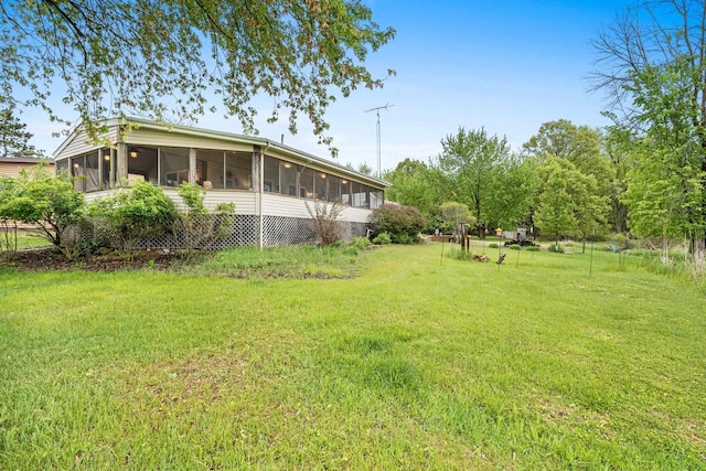 N5101 Lueck Ln, Princeton, WI 54968 - view of grassy yard with a sunroom