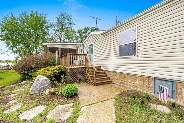 N5101 Lueck Ln, Princeton, WI 54968 - view of side of property with a wooden deck and stairs