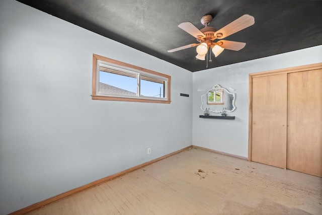 2804 S 64th St, Milwaukee, WI 53219 - unfurnished bedroom with baseboards, light wood finished floors, and a closet