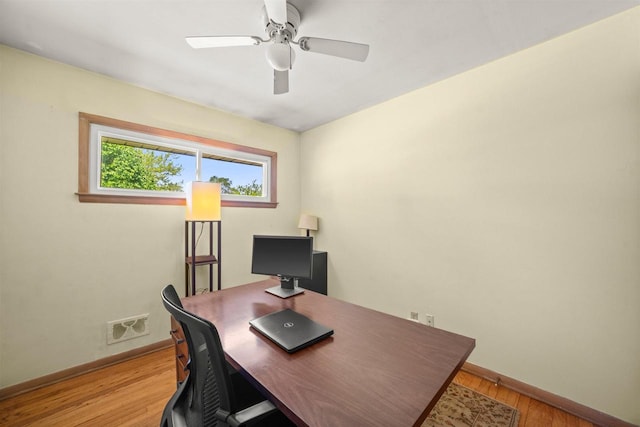 2804 S 64th St, Milwaukee, WI 53219 - office area featuring baseboards, light wood finished floors, and a ceiling fan