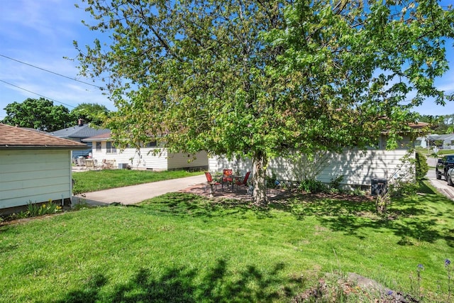 2804 S 64th St, Milwaukee, WI 53219 - view of grassy yard featuring a patio