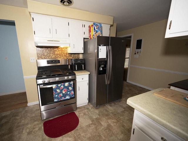 2019 N Mcdonald St, Appleton, WI 54911 - kitchen featuring appliances with stainless steel finishes, under cabinet range hood, tasteful backsplash, white cabinetry, and light countertops