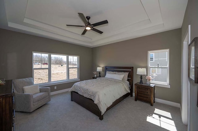 W214N6684 Fairview Dr, Menomonee Falls, WI 53051 - bedroom featuring a raised ceiling, baseboards, and carpet