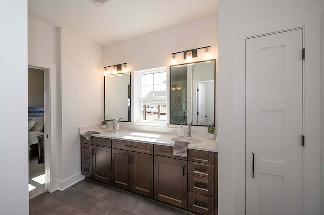 W214N6684 Fairview Dr, Menomonee Falls, WI 53051 - full bath with double vanity, tile patterned floors, and a closet