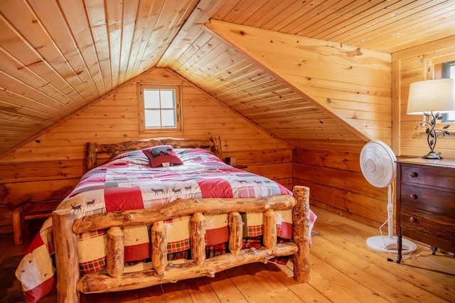 N8378 Timber Trl, New Lisbon, WI 53950 - bedroom with wooden ceiling, wooden walls, lofted ceiling, and hardwood / wood-style flooring