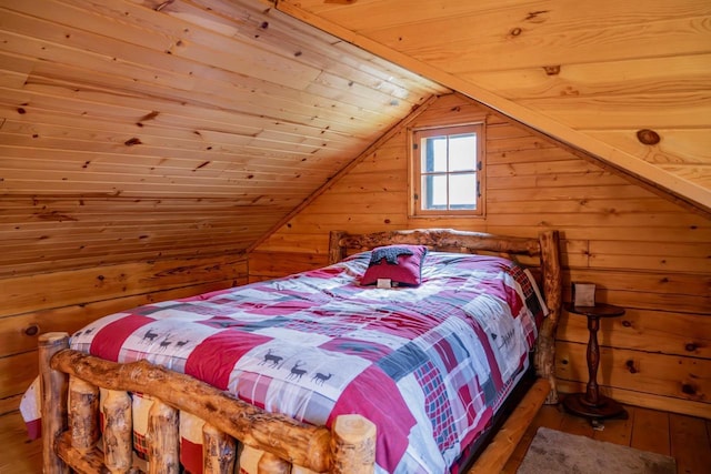 N8378 Timber Trl, New Lisbon, WI 53950 - bedroom with wooden ceiling, wooden walls, wood finished floors, and vaulted ceiling