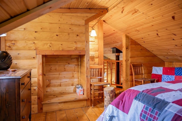 N8378 Timber Trl, New Lisbon, WI 53950 - bedroom featuring wooden walls, lofted ceiling, wood-type flooring, and wood ceiling