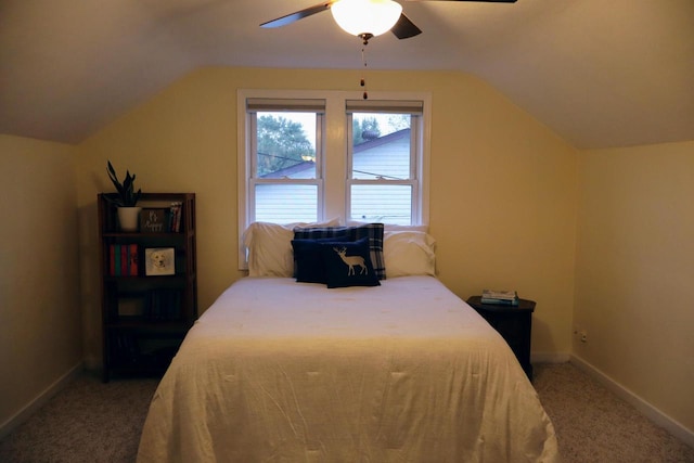 811 Spruce Dr, La Crescent, MN 55947 - bedroom featuring vaulted ceiling, light carpet, baseboards, and a ceiling fan