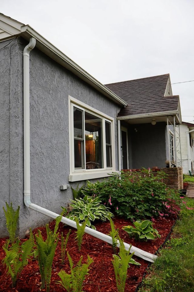 811 Spruce Dr, La Crescent, MN 55947 - view of property exterior featuring stucco siding
