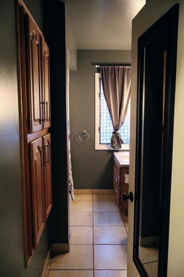 811 Spruce Dr, La Crescent, MN 55947 - bathroom featuring vanity and tile patterned flooring