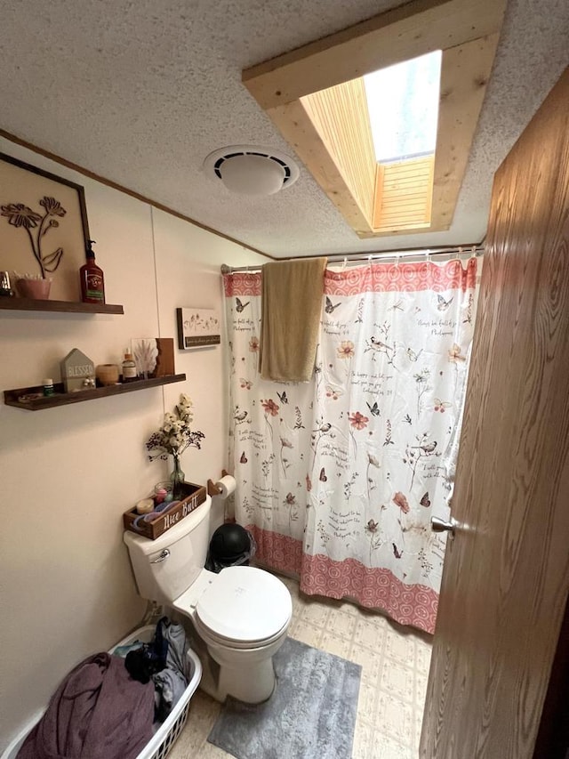 6898 Barbara Dr, Lake Tomahawk, WI 54539 - full bathroom with toilet, tile patterned floors, a textured ceiling, a skylight, and a shower with curtain