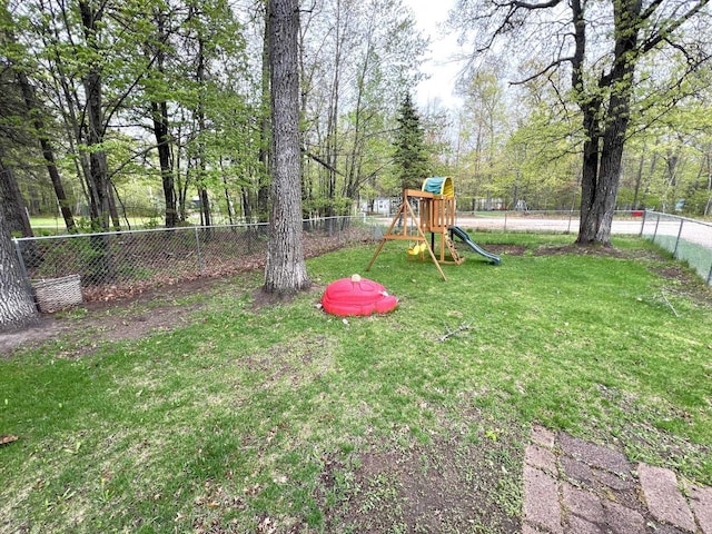 6898 Barbara Dr, Lake Tomahawk, WI 54539 - view of yard with a playground