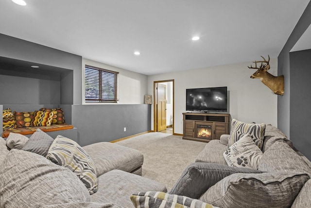 216 Deforest Dr, Kaukauna, WI 54130 - living area with carpet flooring, recessed lighting, a glass covered fireplace, and baseboards
