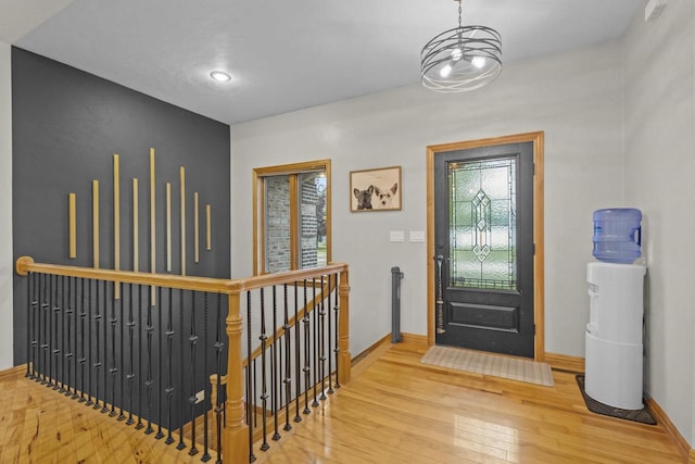 216 Deforest Dr, Kaukauna, WI 54130 - entryway featuring hardwood / wood-style flooring and baseboards
