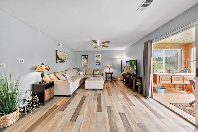 348 County Road B 8, Fontana, WI 53125 - living room featuring ceiling fan and light wood-type flooring