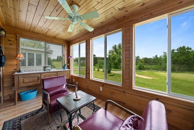 348 County Road B 8, Fontana, WI 53125 - sunroom featuring wood finished floors, wood walls, and wooden ceiling