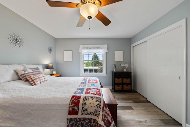 348 County Road B 8, Fontana, WI 53125 - bedroom featuring wood finished floors, a closet, and ceiling fan