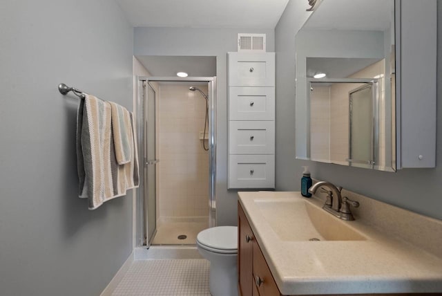 348 County Road B 8, Fontana, WI 53125 - bathroom with vanity, toilet, a shower stall, tile patterned floors, and baseboards