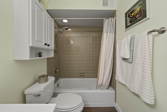 348 County Road B 8, Fontana, WI 53125 - bathroom featuring toilet and shower / bathtub combination with curtain