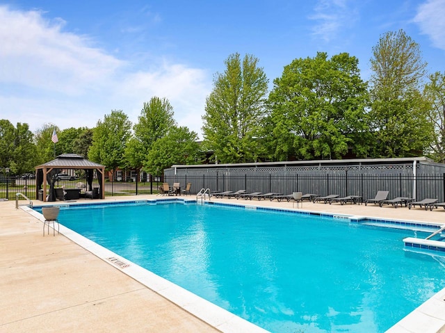 348 County Road B 8, Fontana, WI 53125 - community pool with a gazebo, a patio area, and view of wooded area