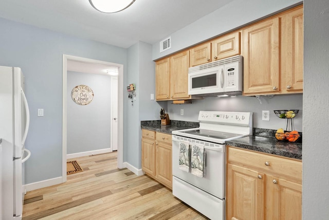 348 County Road B 8, Fontana, WI 53125 - kitchen with white appliances, light brown cabinetry, and dark countertops
