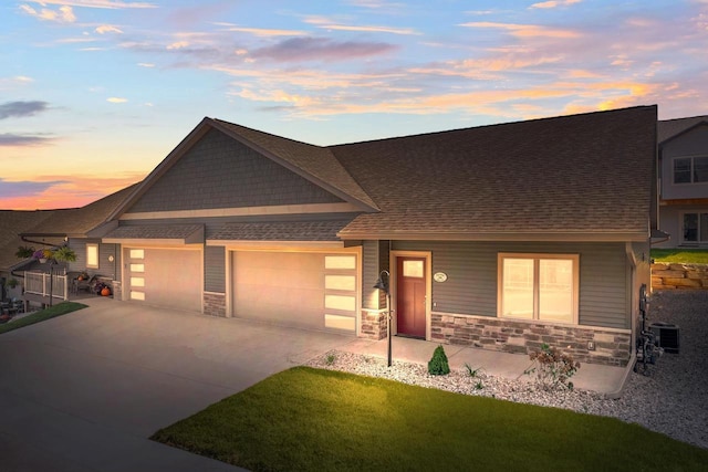 28 Sienna Hills Cir, Mount Horeb, WI 53572 - view of front of home featuring an attached garage, a porch, stone siding, concrete driveway, and a shingled roof