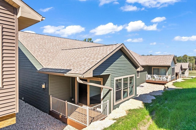 28 Sienna Hills Cir, Mount Horeb, WI 53572 - back of property with roof with shingles and a deck