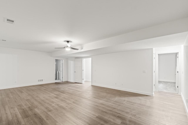 28 Sienna Hills Cir, Mount Horeb, WI 53572 - spare room featuring light wood finished floors, baseboards, and a ceiling fan