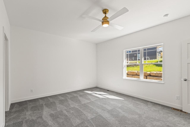28 Sienna Hills Cir, Mount Horeb, WI 53572 - unfurnished room featuring carpet, ceiling fan, baseboards, and a smoke detector