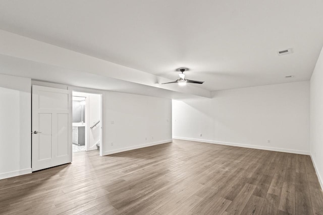 28 Sienna Hills Cir, Mount Horeb, WI 53572 - spare room with wood finished floors, baseboards, and ceiling fan