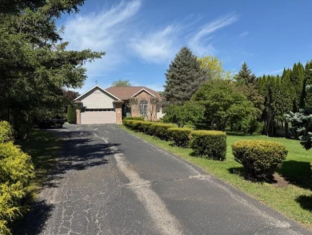 3108 Hawks Haven Trl, Deforest, WI 53532 - view of front of home with an attached garage and driveway