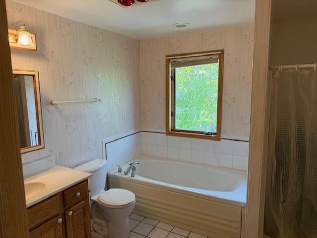 3108 Hawks Haven Trl, Deforest, WI 53532 - bathroom with a garden tub, vanity, toilet, and tile patterned flooring