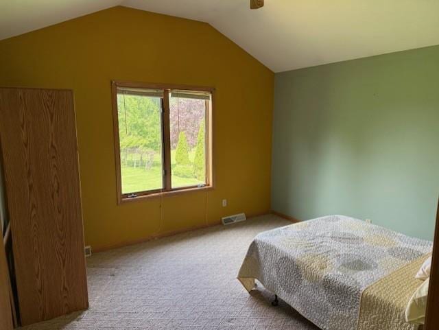 3108 Hawks Haven Trl, Deforest, WI 53532 - bedroom with carpet flooring, vaulted ceiling, and a ceiling fan