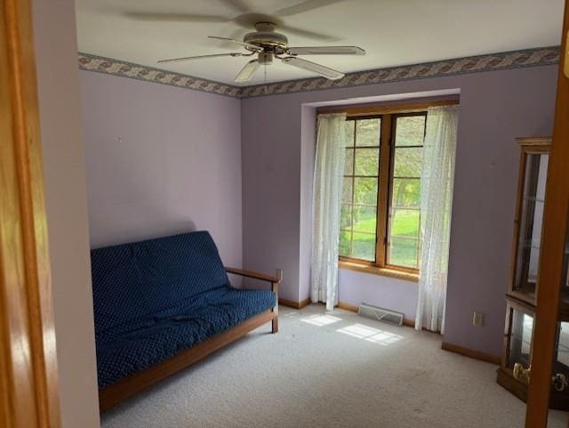 3108 Hawks Haven Trl, Deforest, WI 53532 - living area featuring ceiling fan, carpet, and baseboards