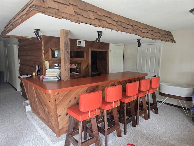2626 Abbe Hill Dr, Eau Claire, WI 54703 - indoor dry bar with carpet floors and baseboards
