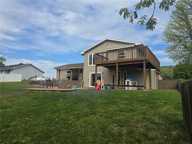 2626 Abbe Hill Dr, Eau Claire, WI 54703 - rear view of property featuring a deck and a patio