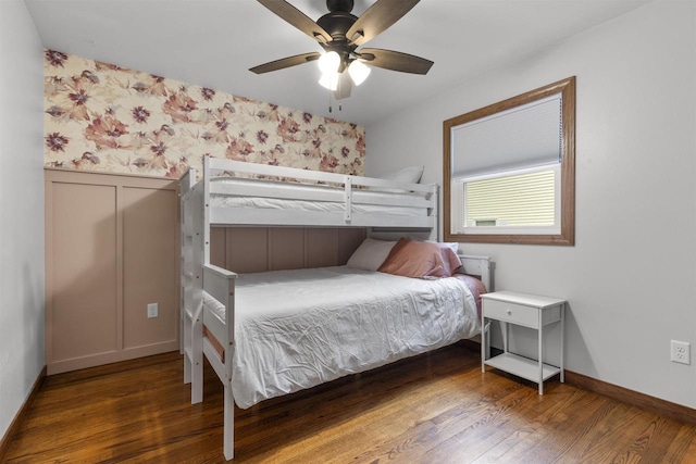 2104 Hazel St, Oshkosh, WI 54901 - bedroom with wallpapered walls, wood finished floors, baseboards, and a ceiling fan