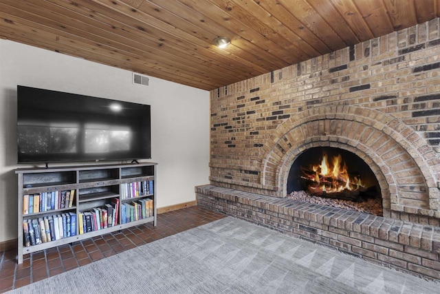 2104 Hazel St, Oshkosh, WI 54901 - living area featuring baseboards, a fireplace, and wooden ceiling