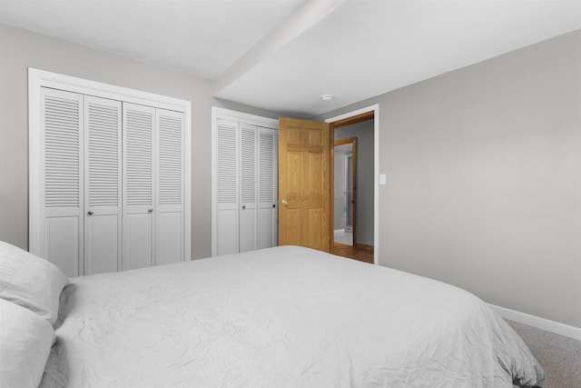 2104 Hazel St, Oshkosh, WI 54901 - bedroom with baseboards, carpet, and multiple closets