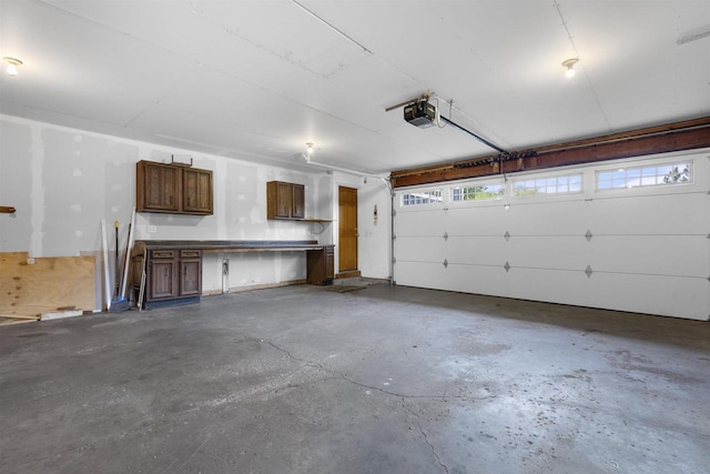 2104 Hazel St, Oshkosh, WI 54901 - garage featuring a garage door opener