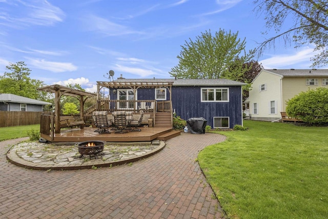 2104 Hazel St, Oshkosh, WI 54901 - back of property with an outdoor fire pit, a pergola, a deck, and a patio area