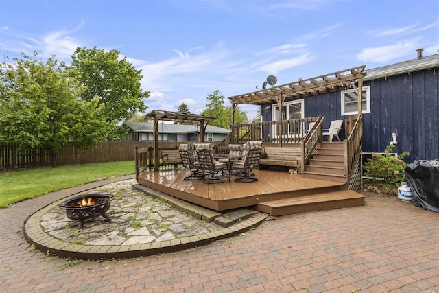2104 Hazel St, Oshkosh, WI 54901 - wooden deck featuring a fire pit, a pergola, and a patio area