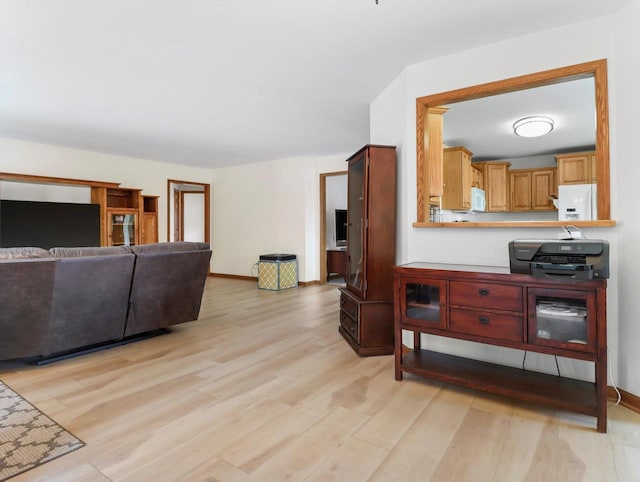 W11065 Menominee Rd, Portage, WI 53901 - living area with light wood-style flooring and baseboards