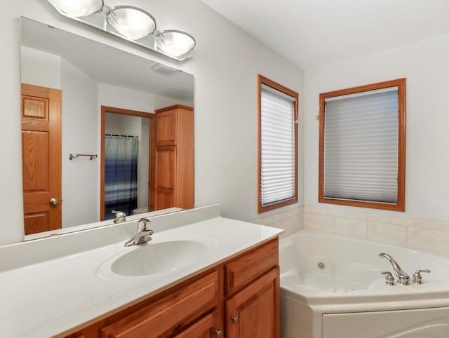 W11065 Menominee Rd, Portage, WI 53901 - full bath with vanity, a jetted tub, and curtained shower